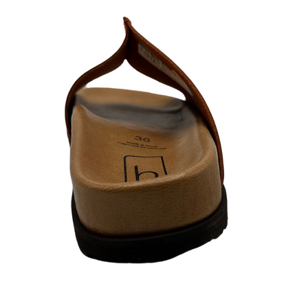 Back view of peach leather slide on sandal with lined contoured footbed