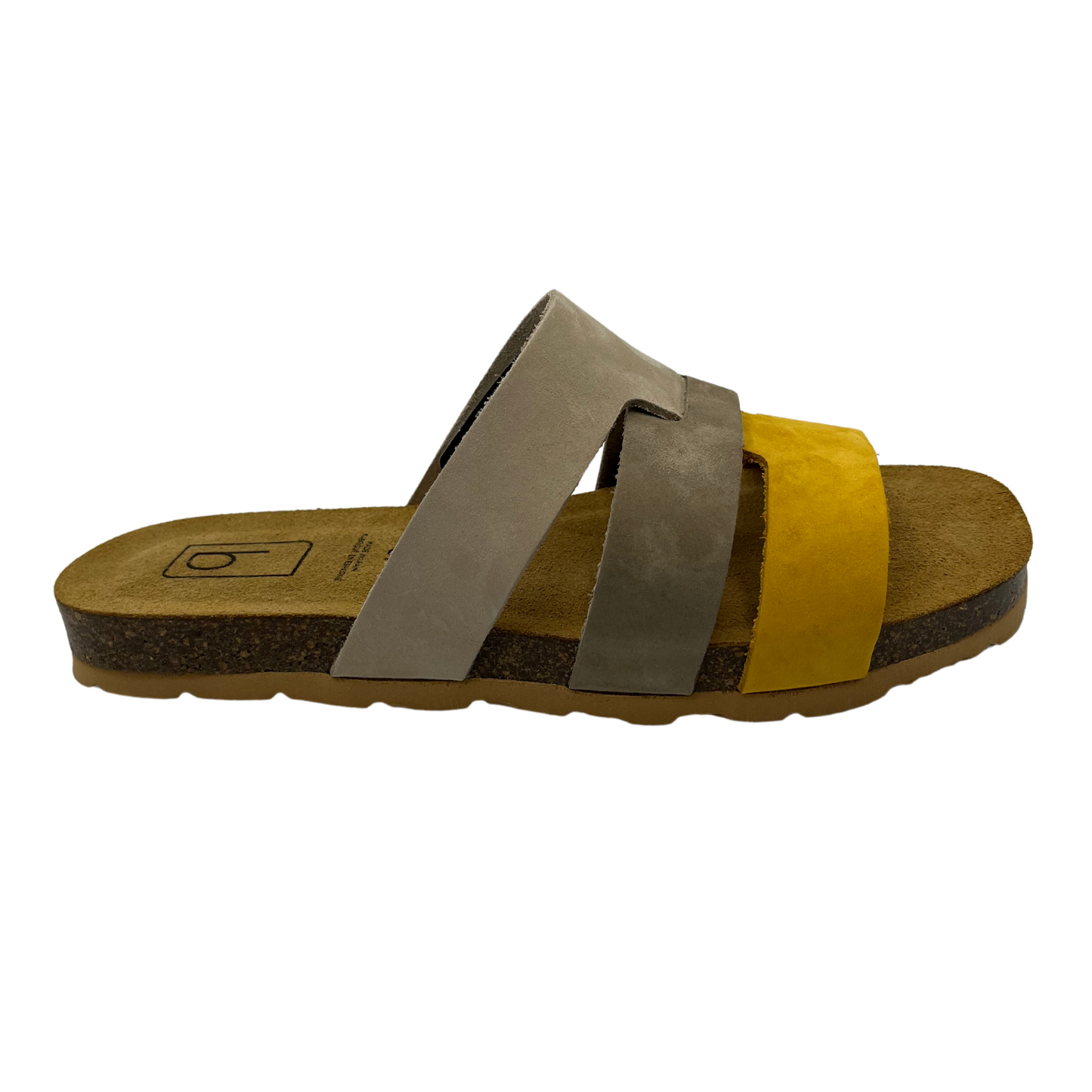 Right facing view of beige and yellow suede slip on sandal with tan lined contoured footbed