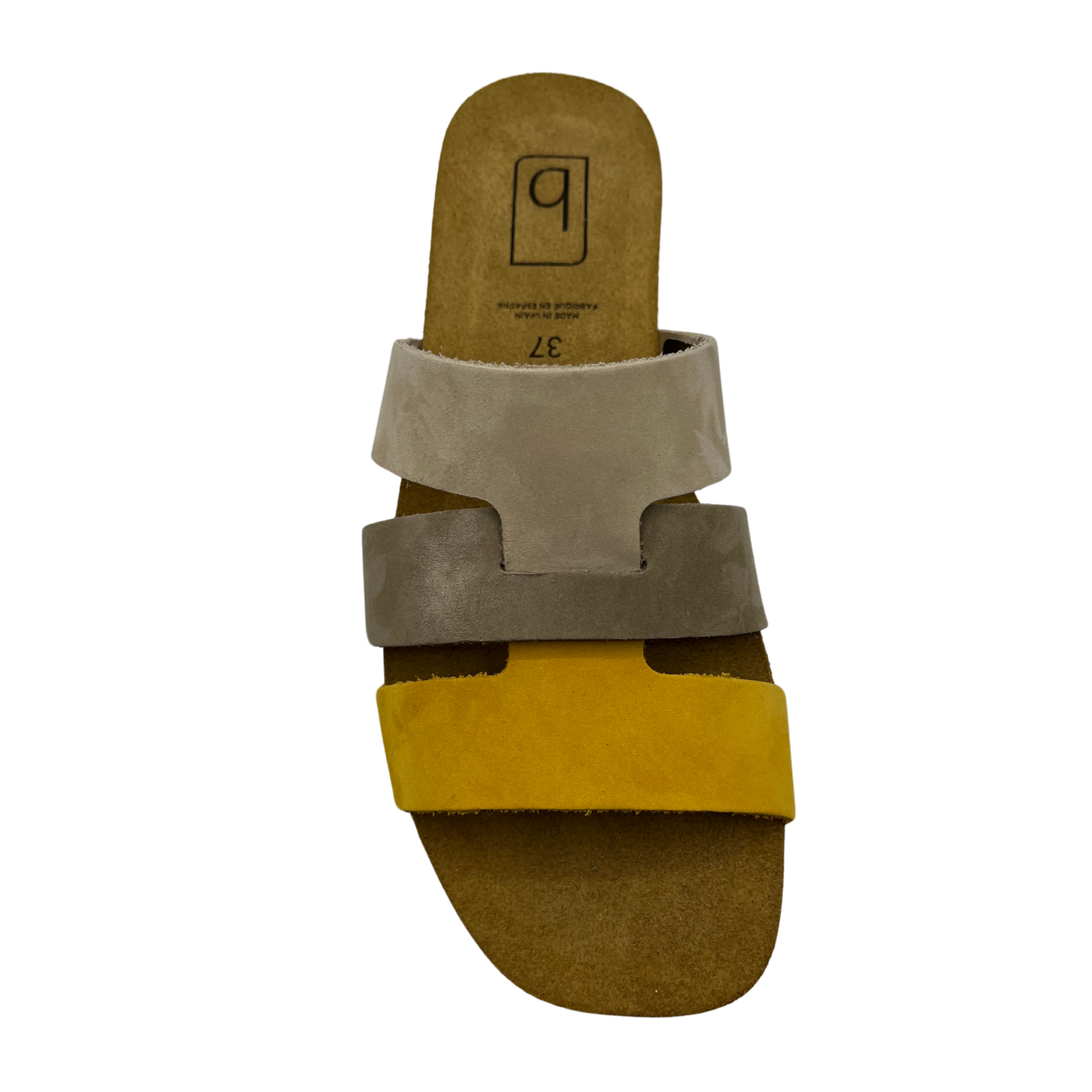 Top view of beige and yellow suede slip on sandal with tan lined contoured footbed