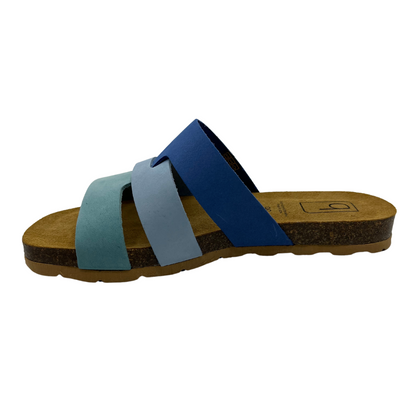 Left facing view of blue suede slip on sandal with suede lined contoured footbed