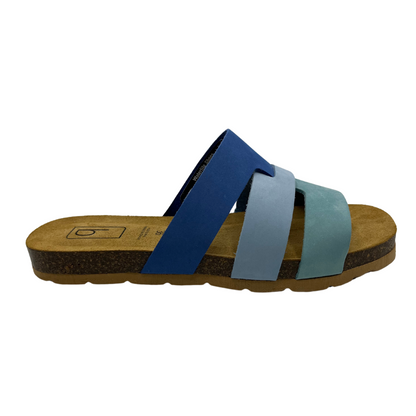Right facing view of blue suede slip on sandal with suede lined contoured footbed