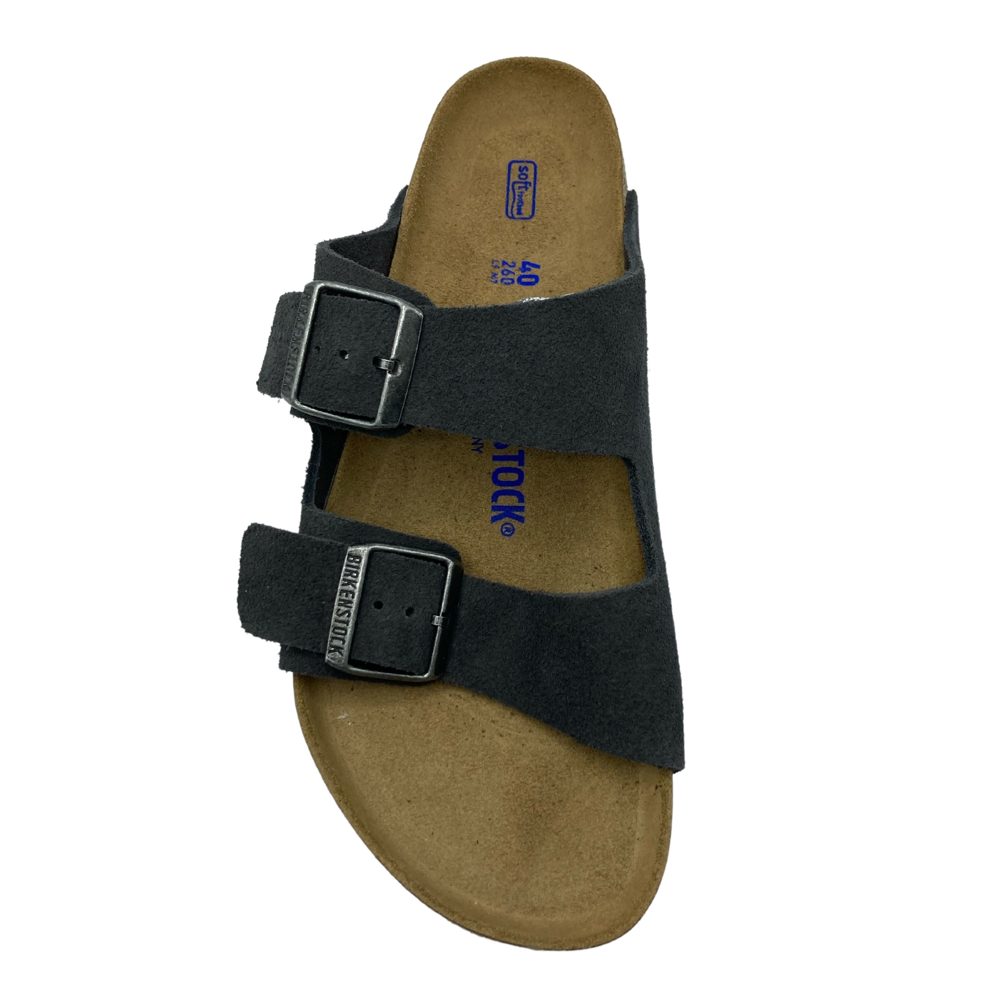 Top view of sandal with dark grey upper straps and brown footbed