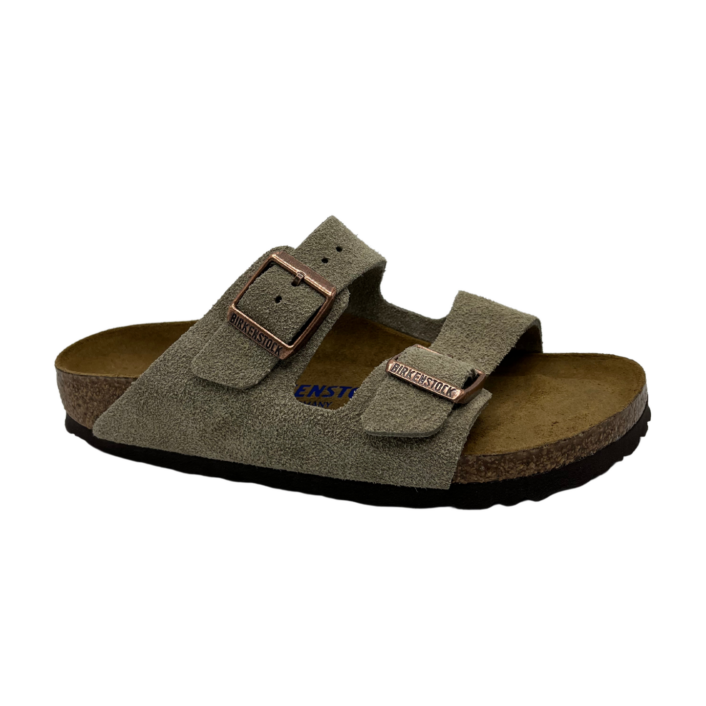 45 degree angled view of contoured footbed sandal with taupe straps and silver buckles