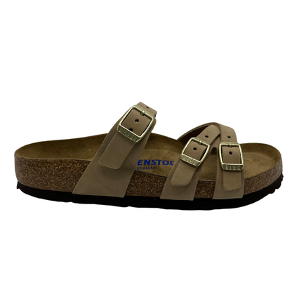 Right facing view of taupe strapped sandals with contoured footbed and three straps