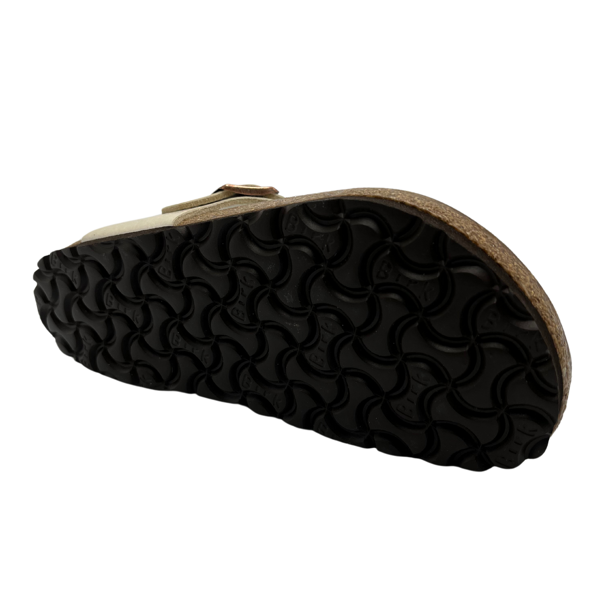 Bottom view of synthetic leather thong sandal with bronze buckle strap and suede lined contoured footbed.