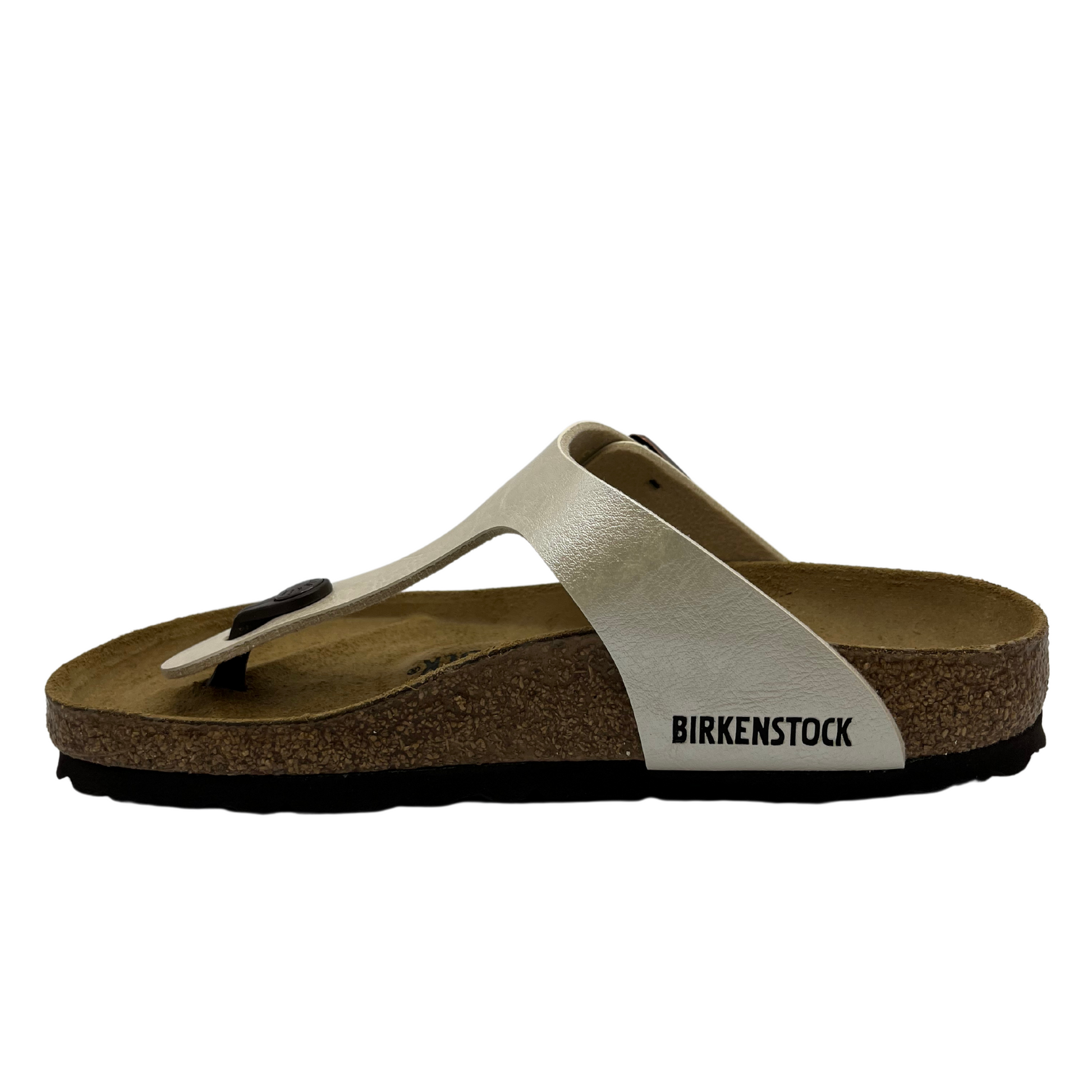Left facing view of synthetic leather thong sandal with bronze buckle strap and suede lined contoured footbed.