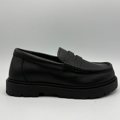Right facing view of a black leather loafer with a black outsole