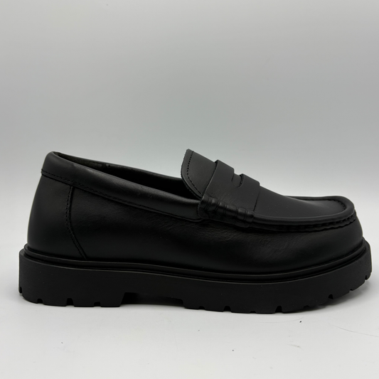 Right facing view of a black leather loafer with a black outsole