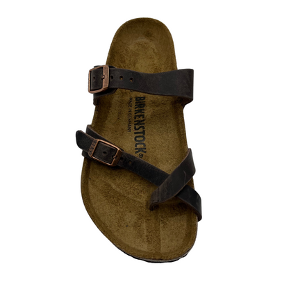 Top view of oiled leather strapped sandals with two pin buckle straps, suede lined contoured cork footbed
