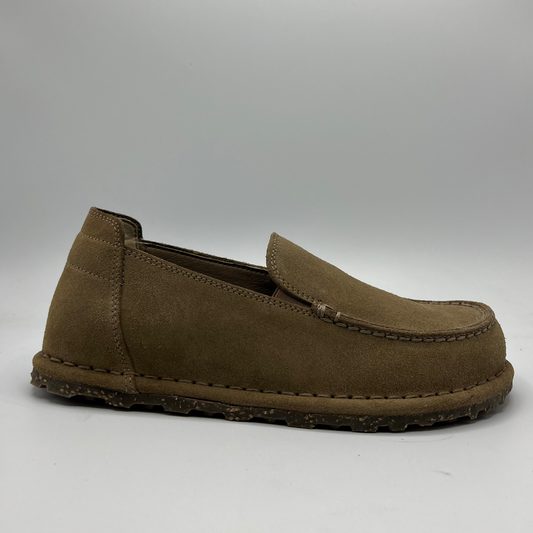 Brown loafer shoe on a gray background