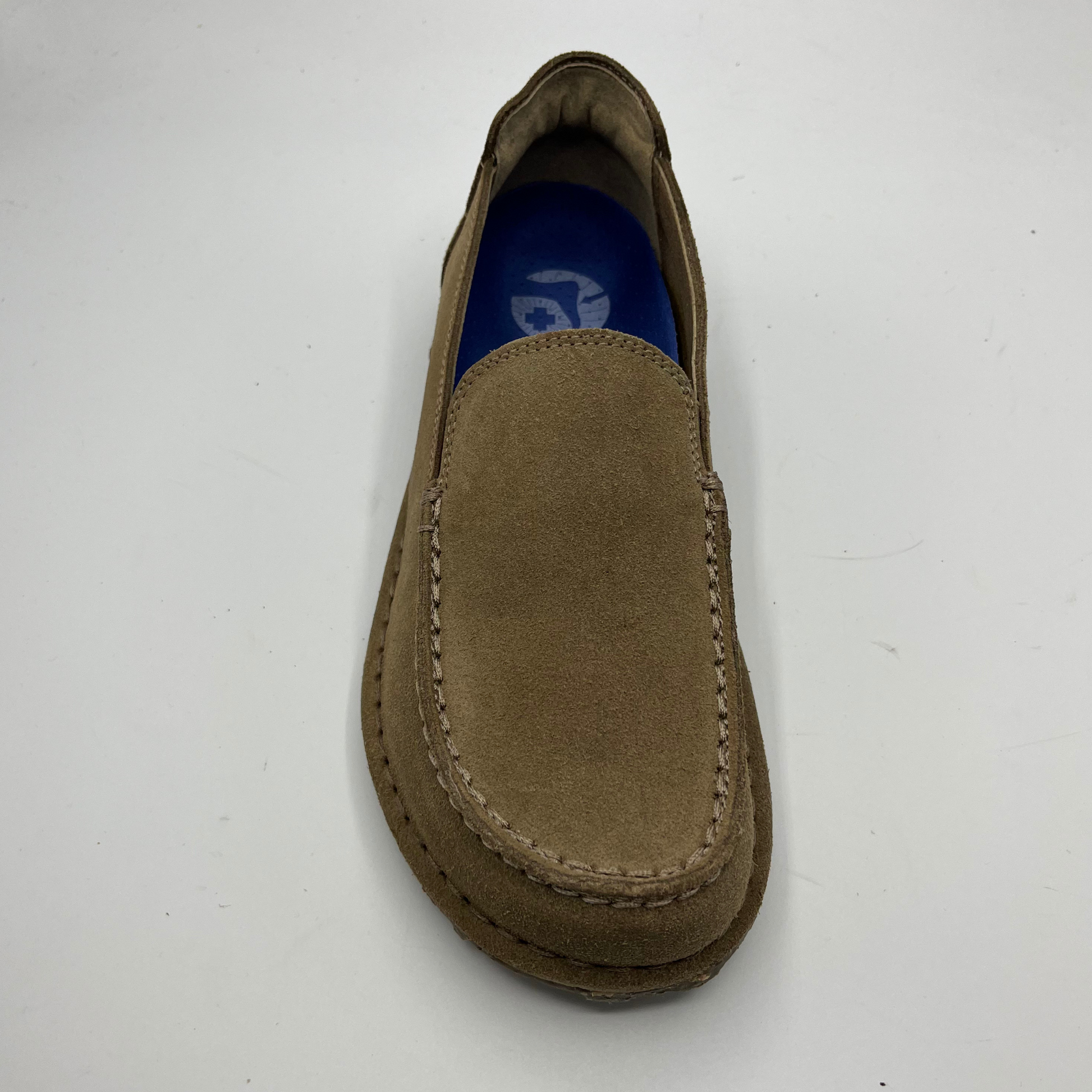 Brown loafer shoe on a white background