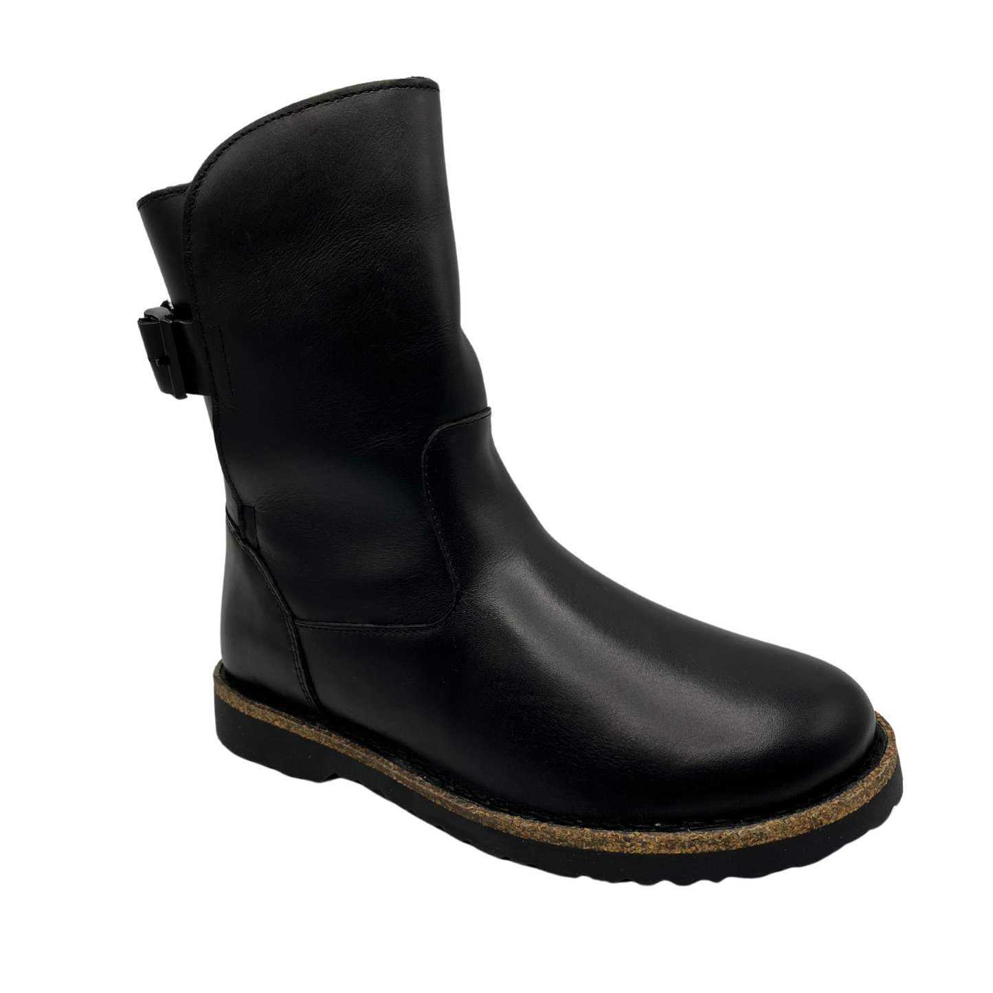 45 degree angled view of black leather boot with rubber and cork outsole.