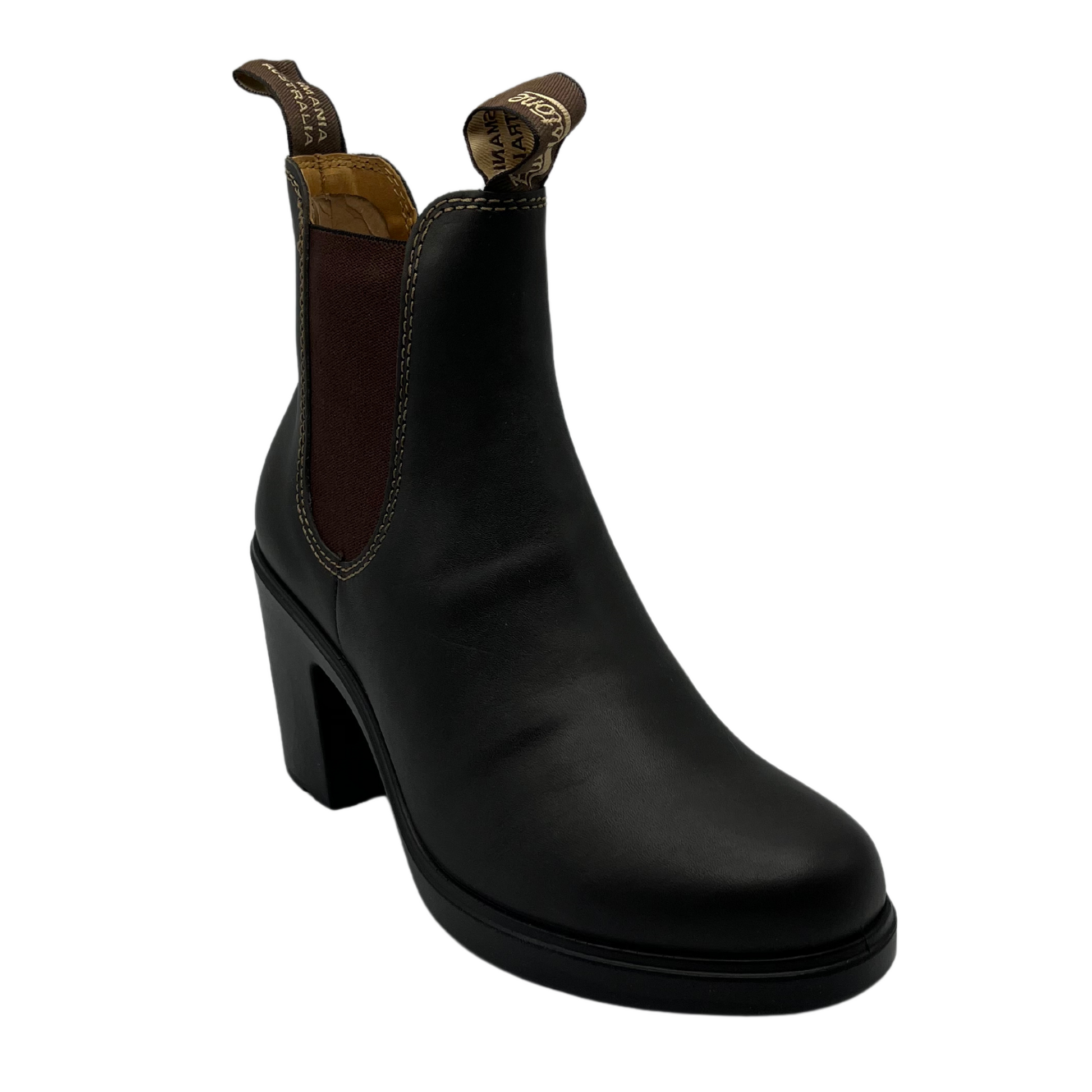 45 degree angled view of stout brown heeled chelsea boot with 3 inch heel