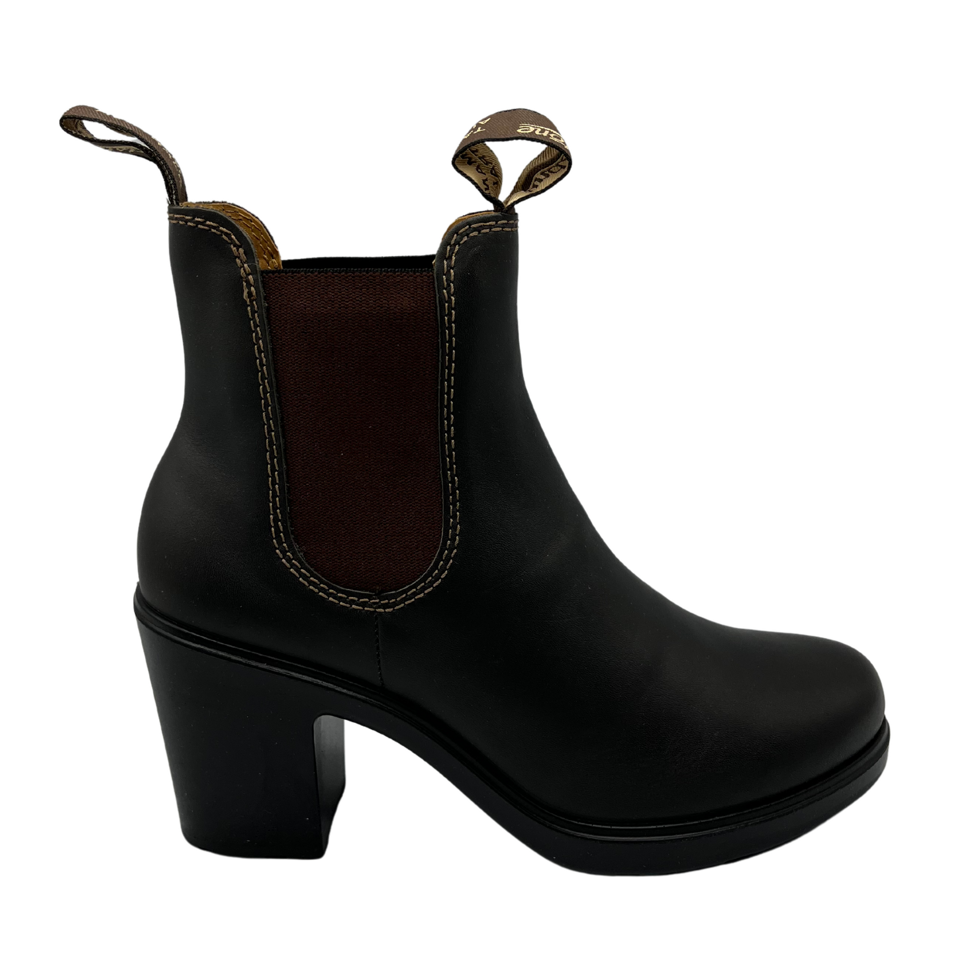 Right facing view of stout brown leather chelsea boot with 3 inch heel and elastic side gore
