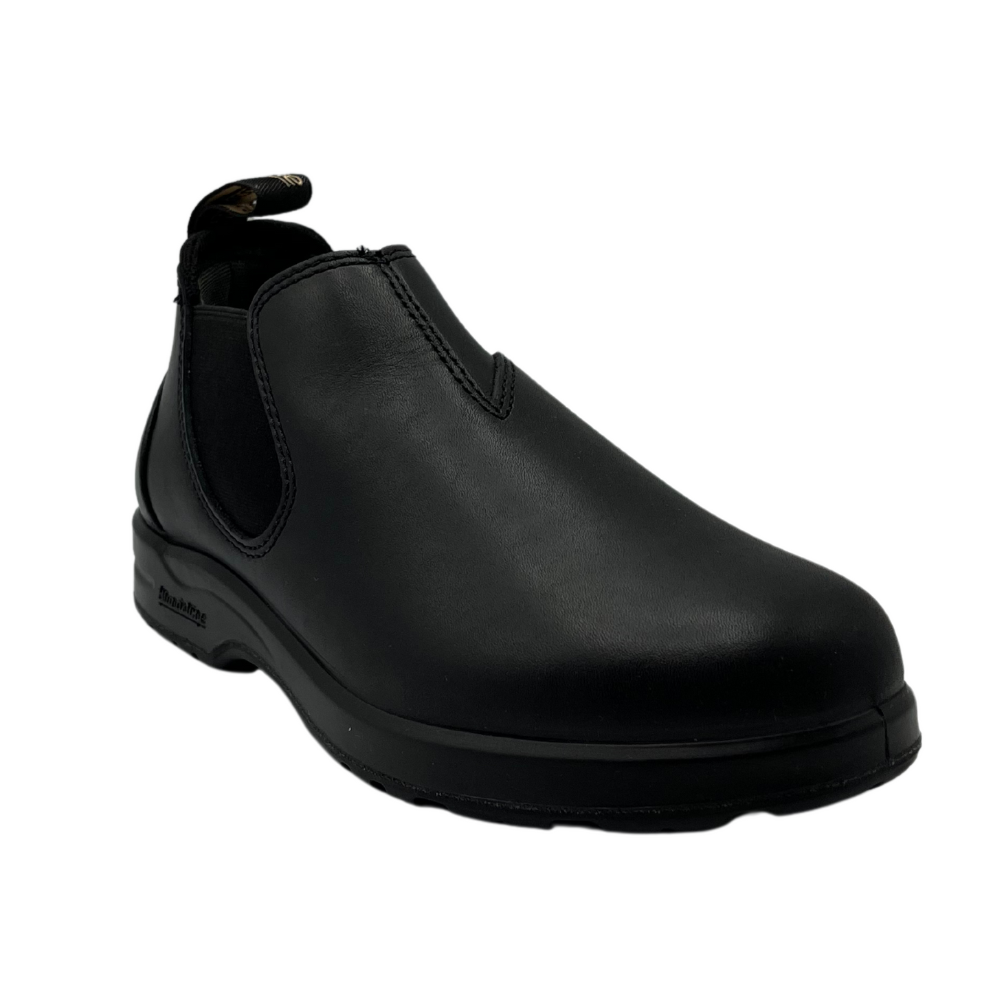 45 degree angled view of black leather ankle boot with elastic side gore and pull on heel tab