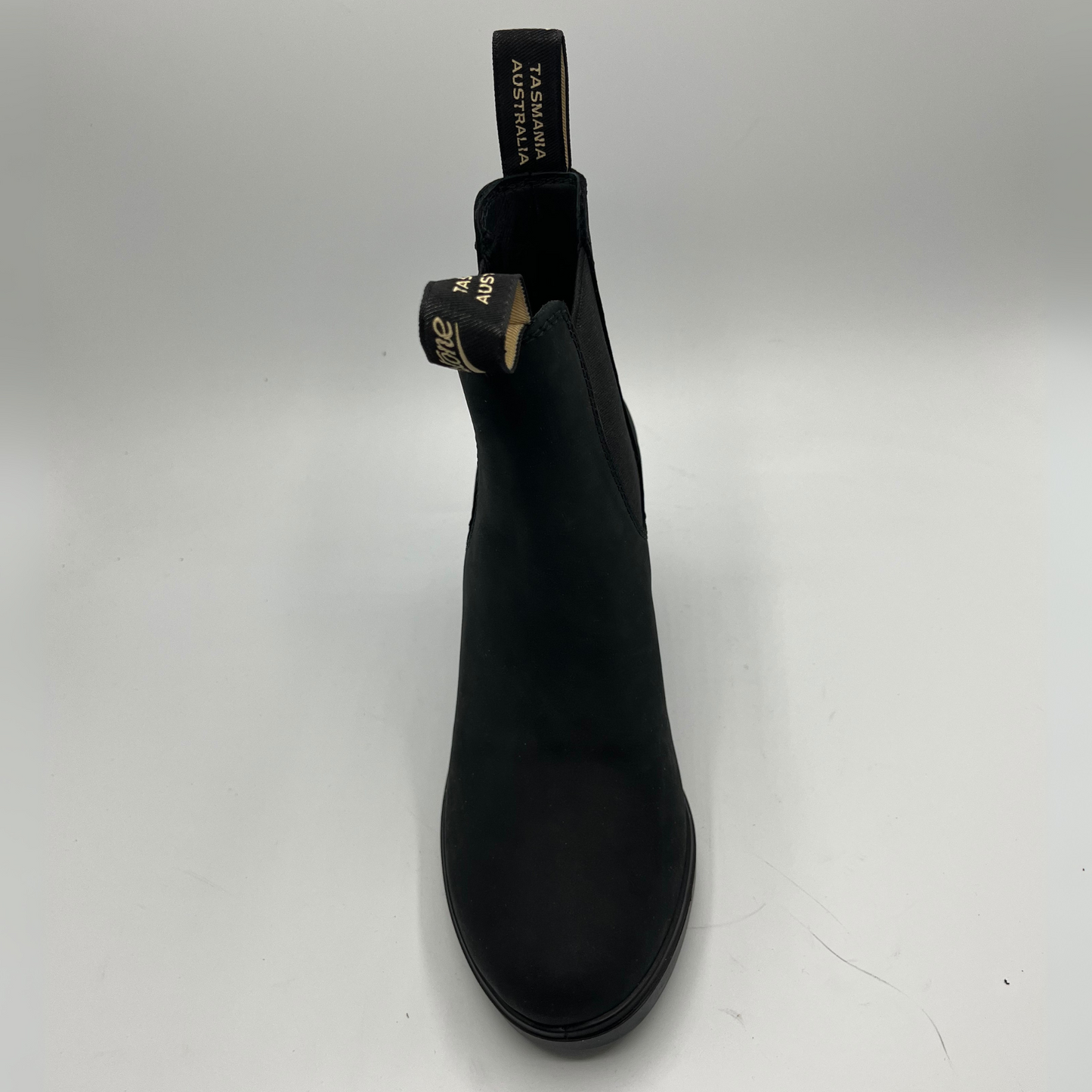 Black boot on a white background