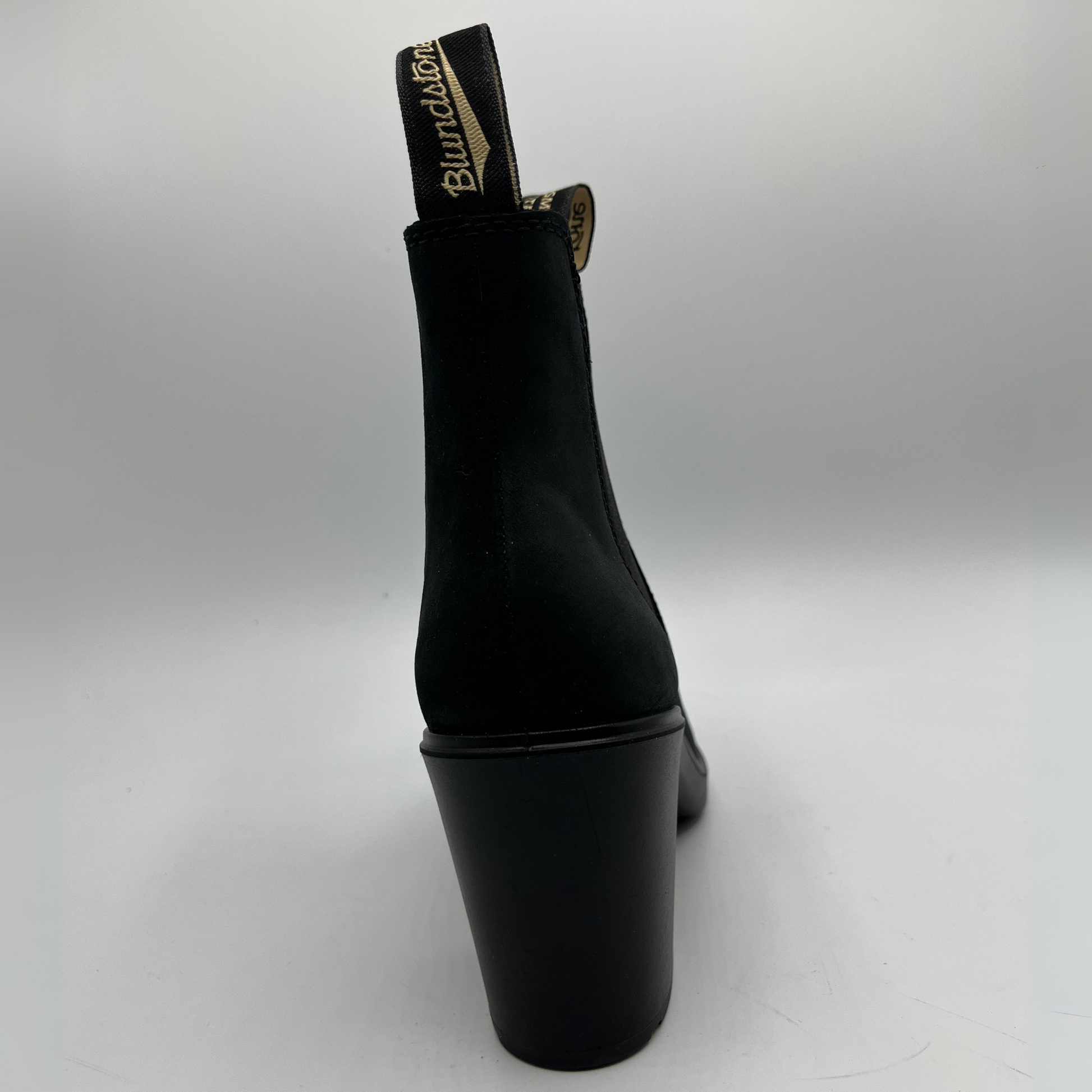 Black ankle boot on a white background