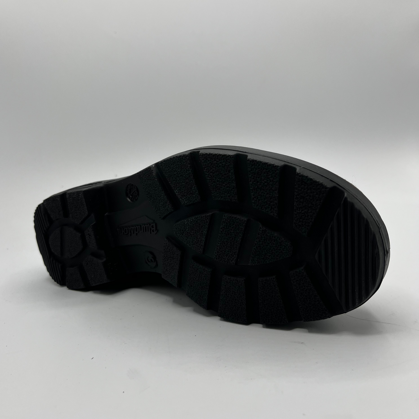 Black sole of a shoe on a white background