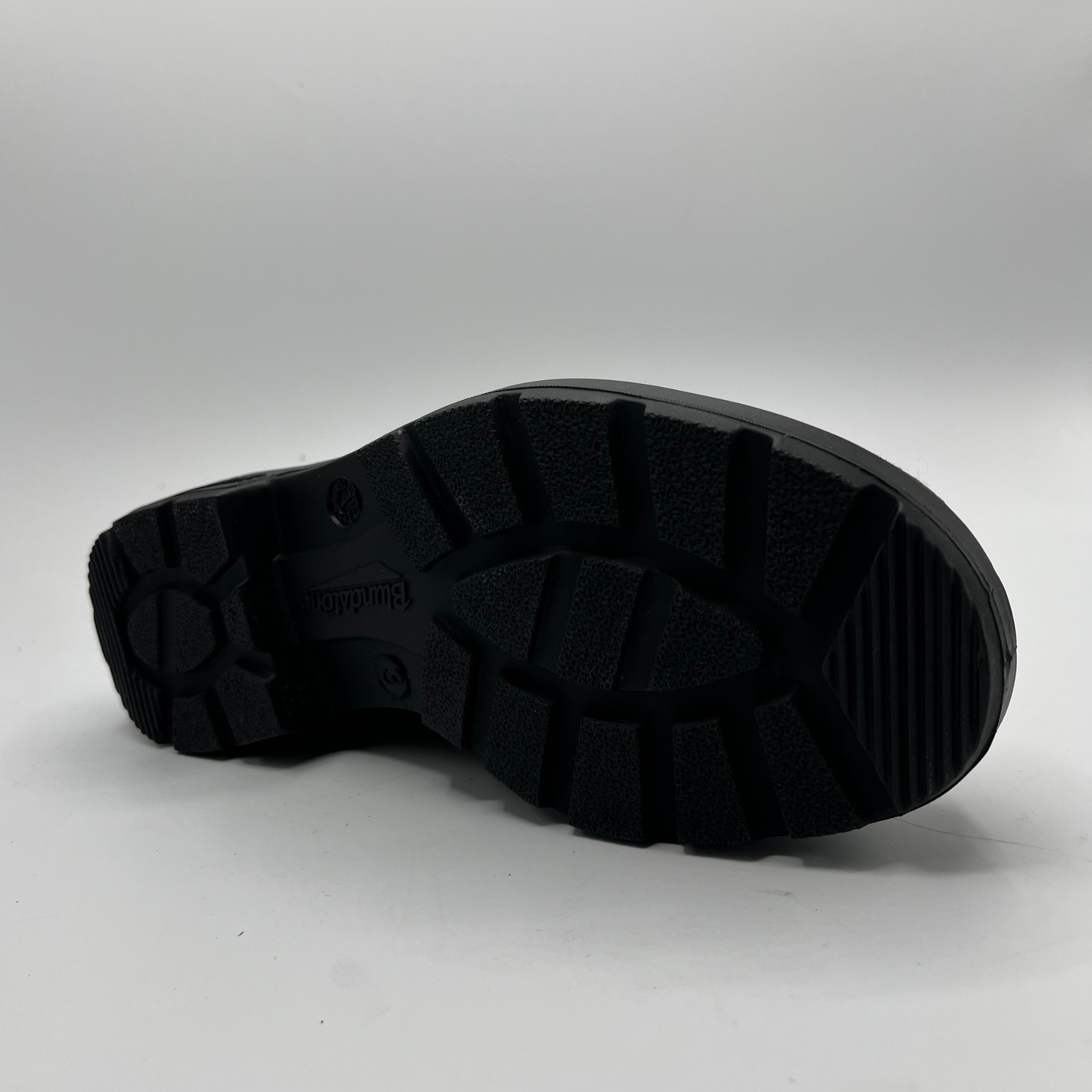 Black sole of a shoe on a white background