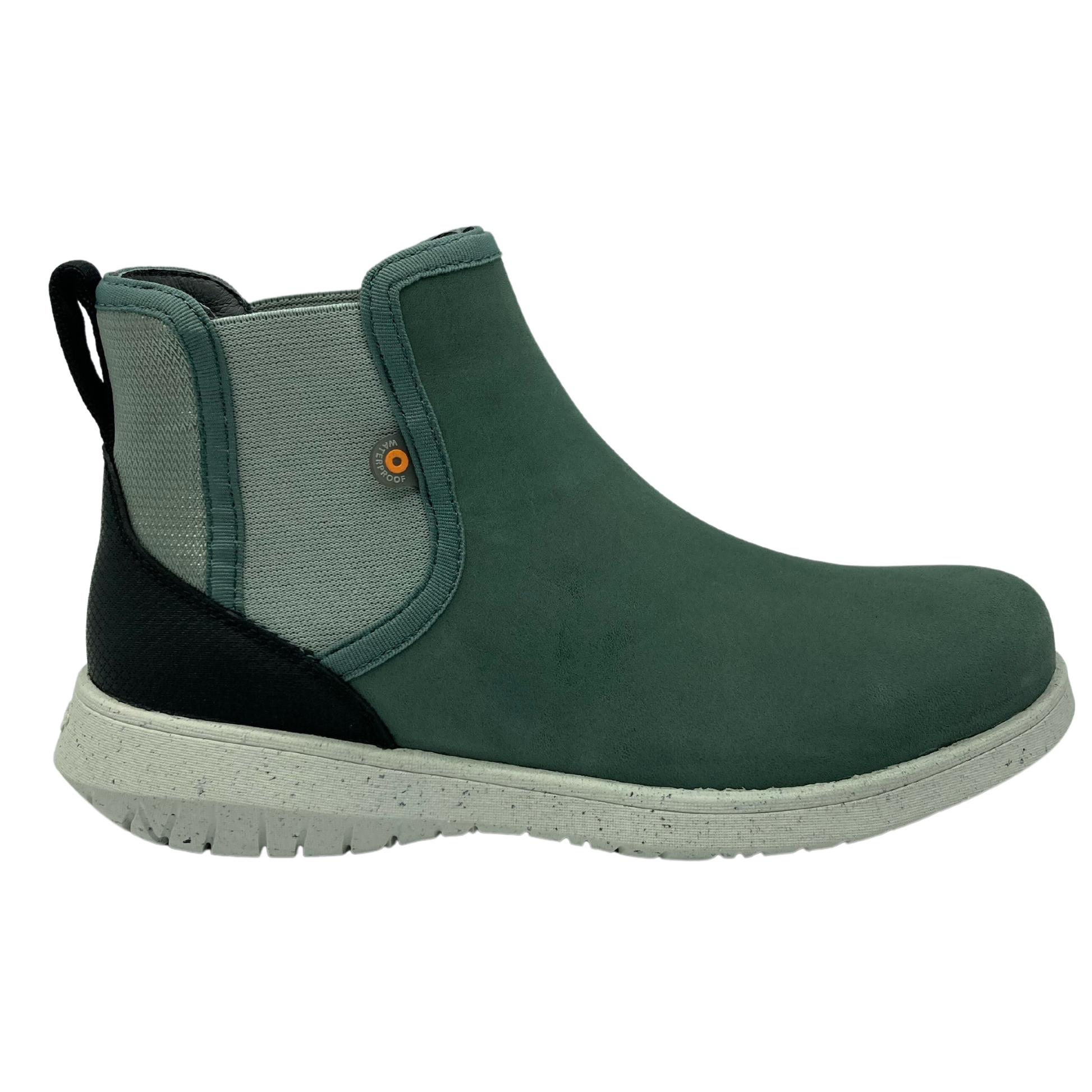 Right facing view of light green leather short boot with elastic side gores and white outsole