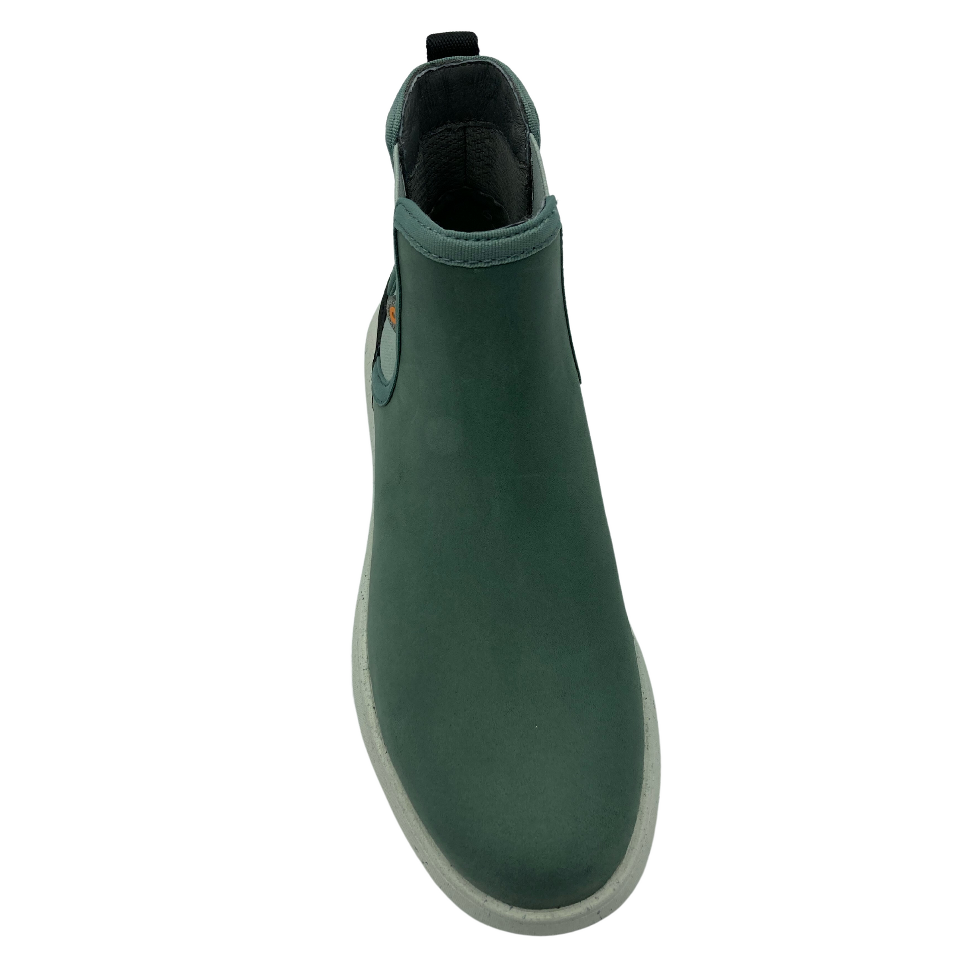 Top view of light green, short leather boot with rounded toe and white outsole