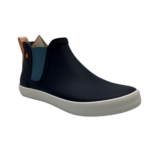 45 degree angled view of waterproof navy ankle boot with elasticated side gores and white outsole