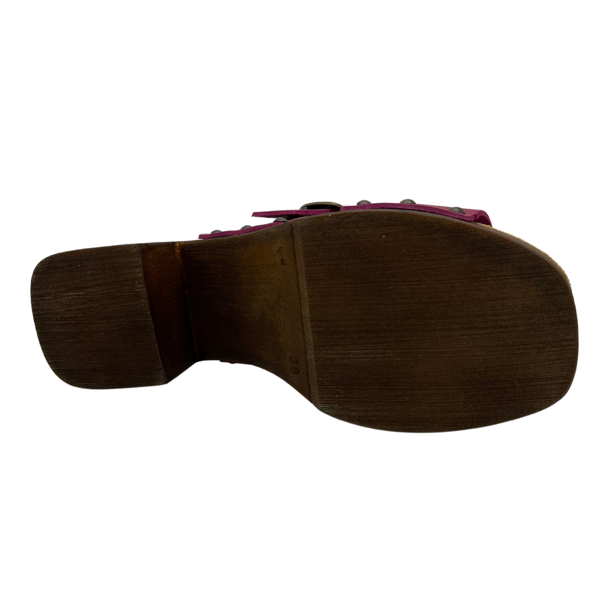 Bottom view of magenta leather sandals with chunky block heel and lined footbed