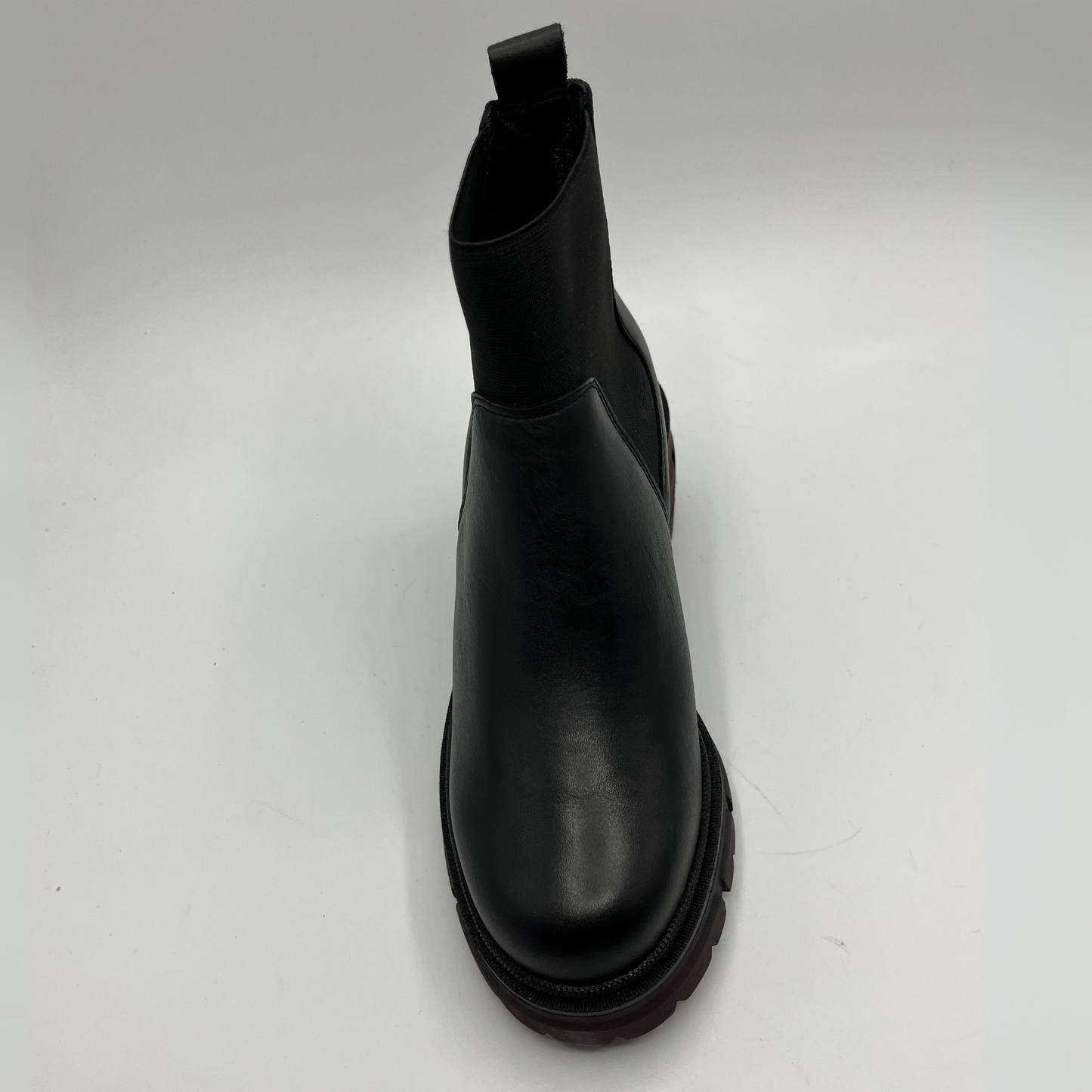 Black Chelsea boot on a white background