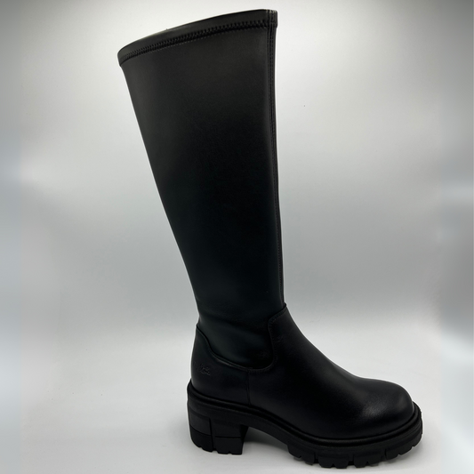 Black knee-high boot on a gray background