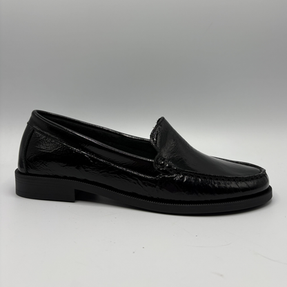 Black loafer shoe on a white background