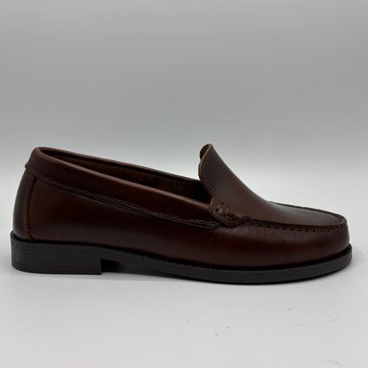 Brown loafer shoe on a white background