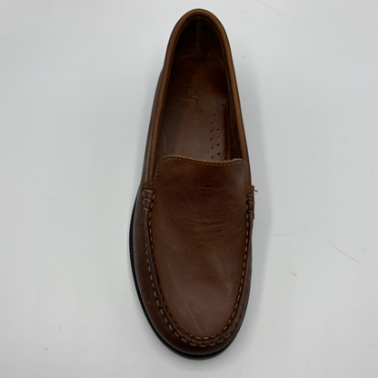 Brown leather loafer shoe on a white background
