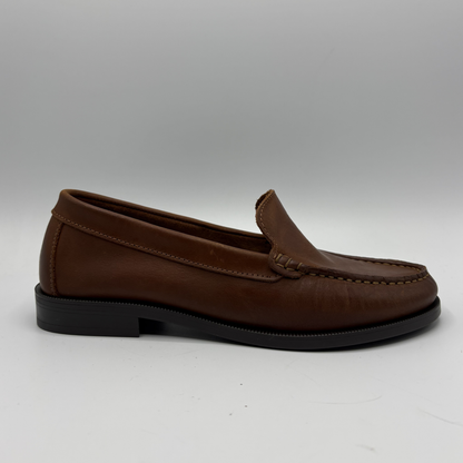 Brown loafer shoe on a white background