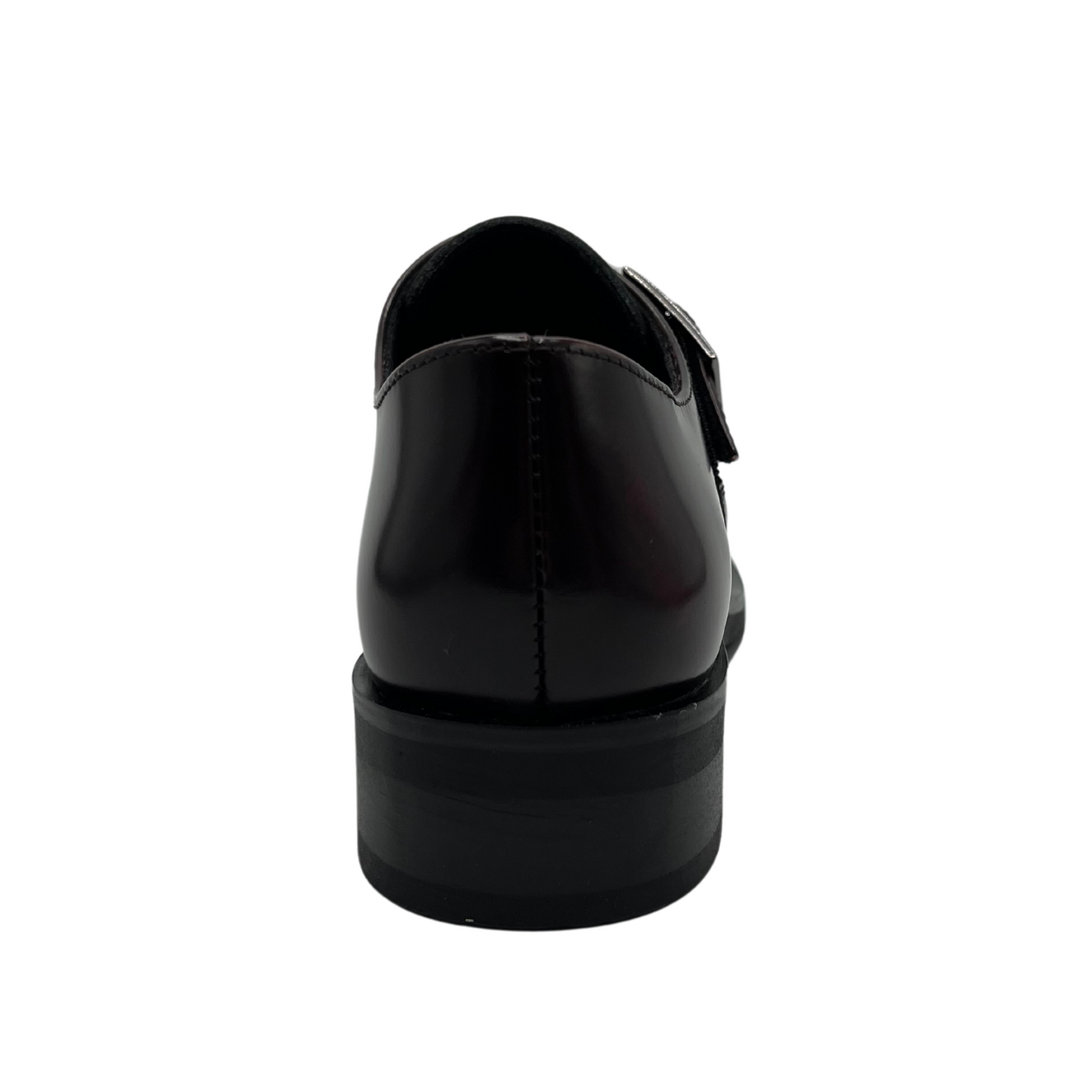 Back view of bordo leather loafer with silver buckle on upper, low heel and leather lining.