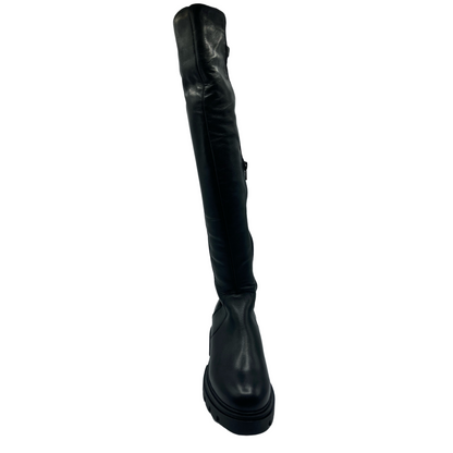 Front view of black leather thigh high boot with rounded toe and black platform rubber sole
