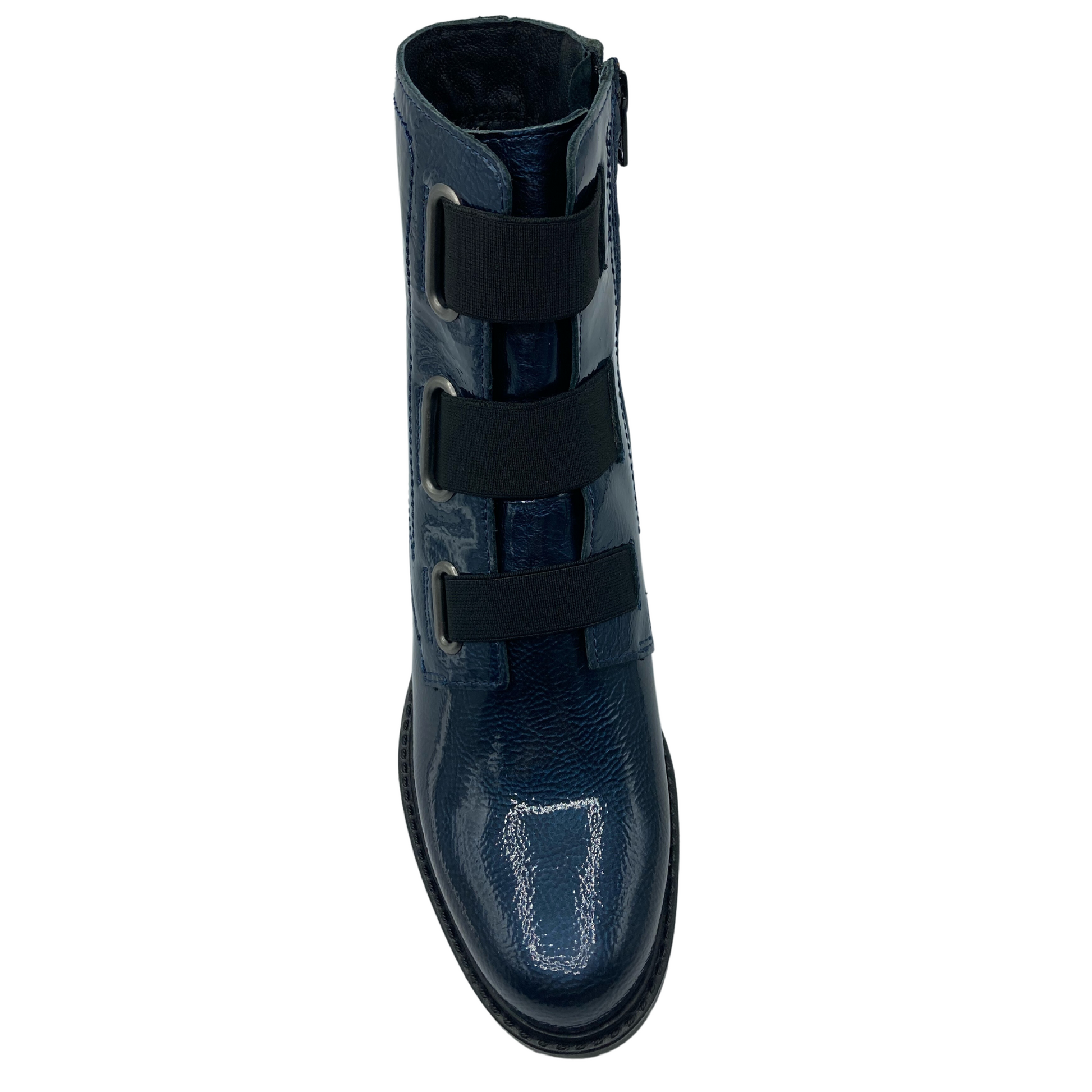 Front view of blue patent leather short boot with elastic front and side zipper closure