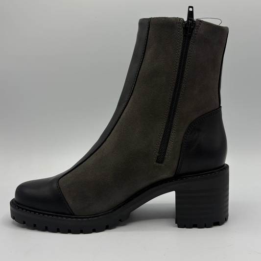 Left view of a two toned black short boot with a stacked heel and rounded toe