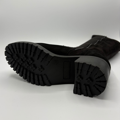 Bottom view of a black tall boot with a side zipper and a chunky heel