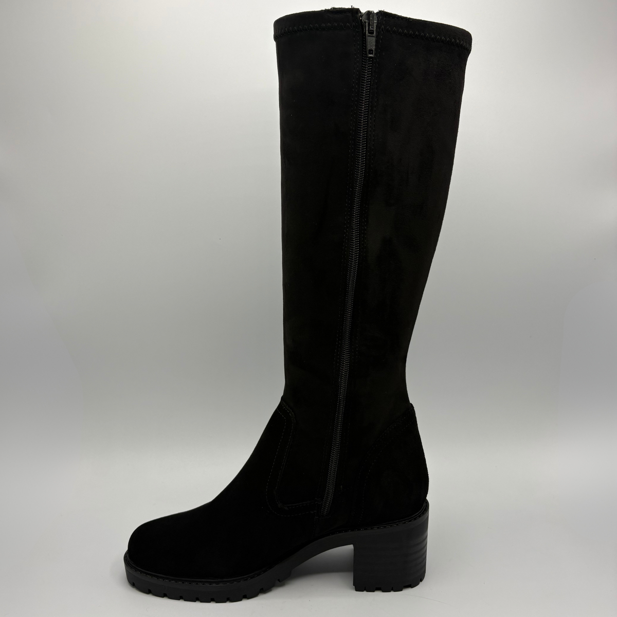 Left facing view of a black tall boot with a side zipper