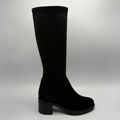 Right facing view of a black tall boot with a chunky heel