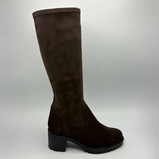 Right facing view of a brown suede boot with a sturdy heel