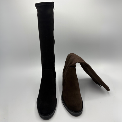 Front view of a black tall boot beside a brown tall boot. Both have a side zipper and a rounded toe