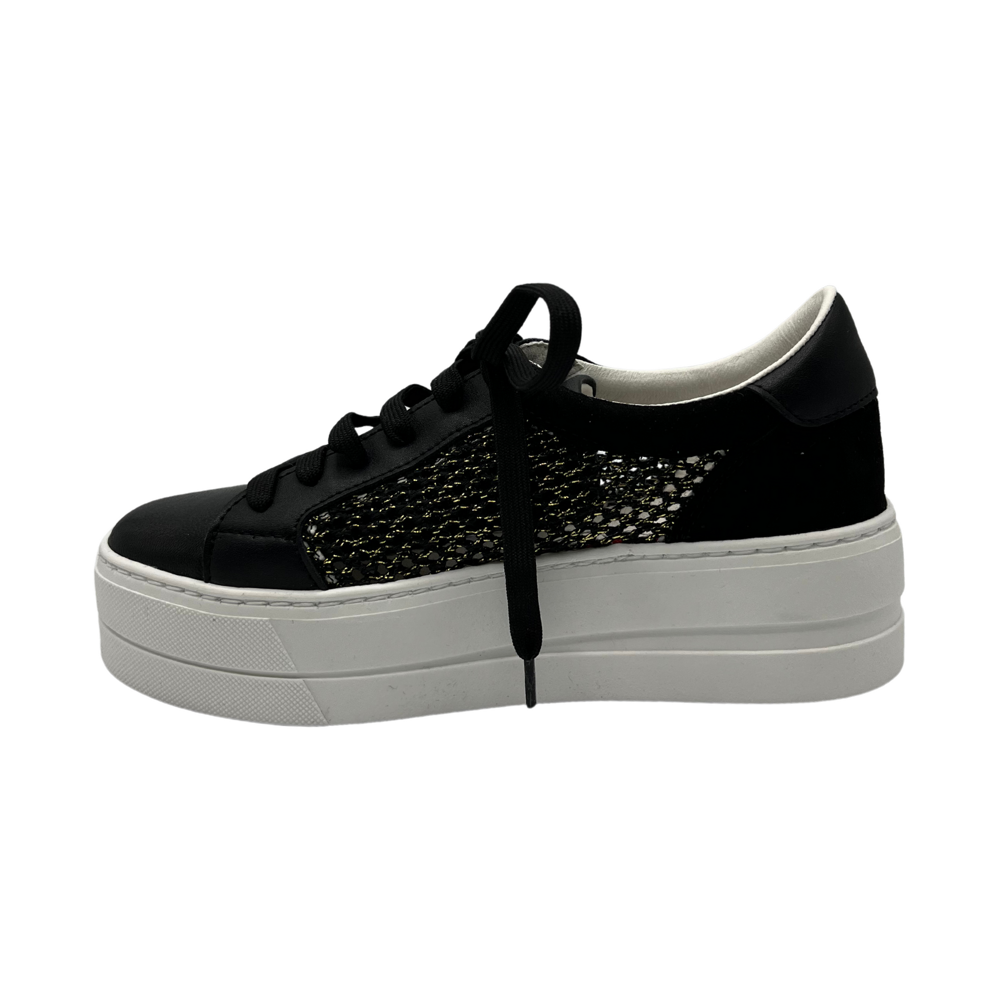 Left facing view of black leather sneaker with platform white rubber outsole. Mesh side with gold details and black laces.