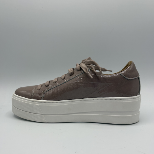 Brown platform sneaker on a gray background