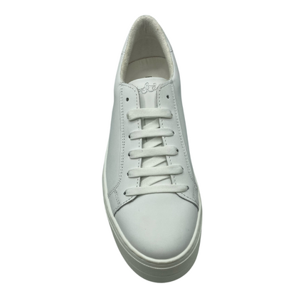Top view of white leather sneaker with platform rubber sole