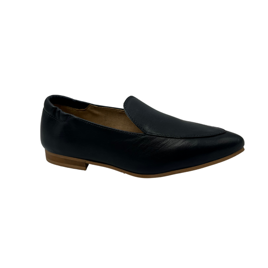 Angled view of navy leather loafer with pointed toe and short block heel, leather lining and elasticated back.