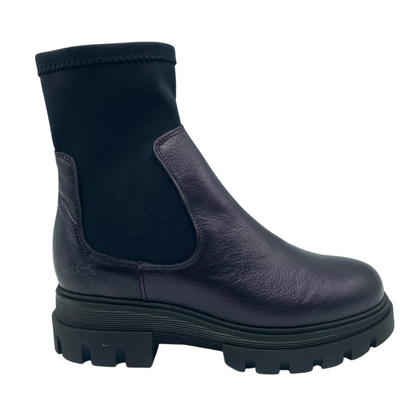 Right facing view of dark purple short boot with black elastic upper and platform rubber sole