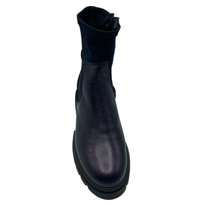 Front facing view of dark purple short boot with black elastic upper and black rubber sole
