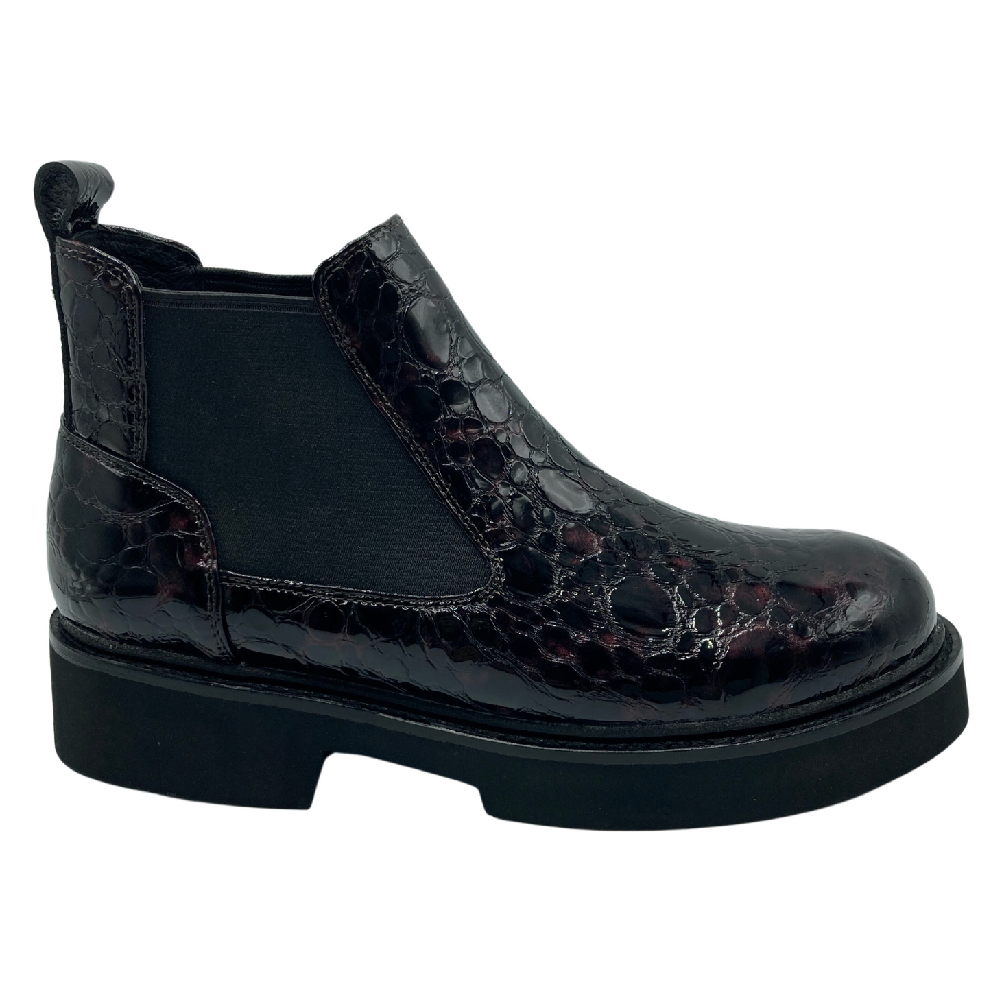 Right facing view of textured leather ankle boot with black elastic double gore with black rubber sole