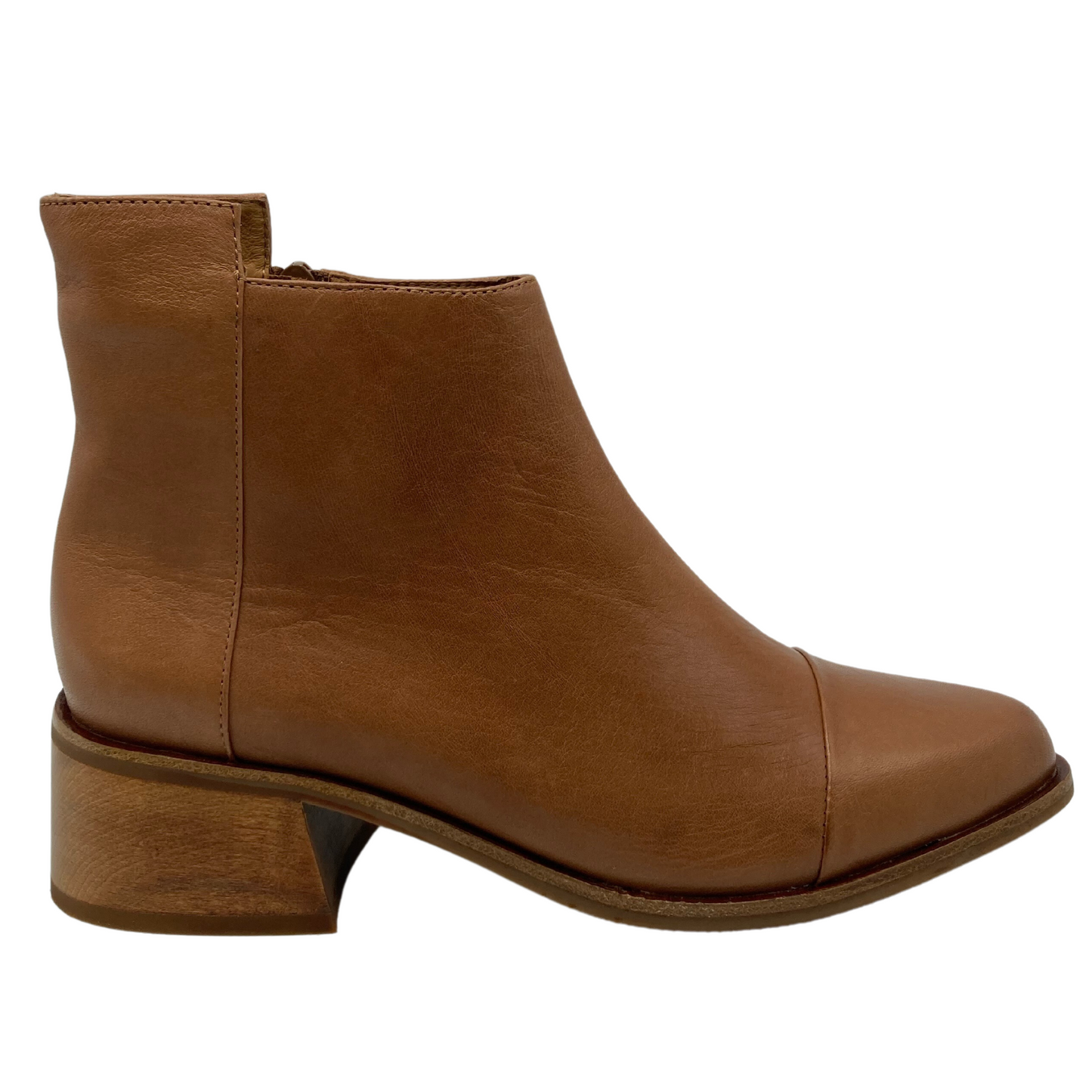 Right facing view of brown leather ankle boot with pointed toe and block heel